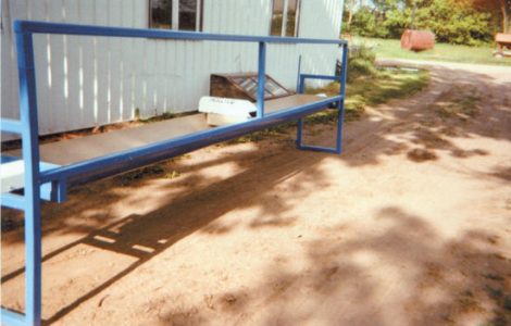 Water Trough Tips Forward for Easy Cleanout Image